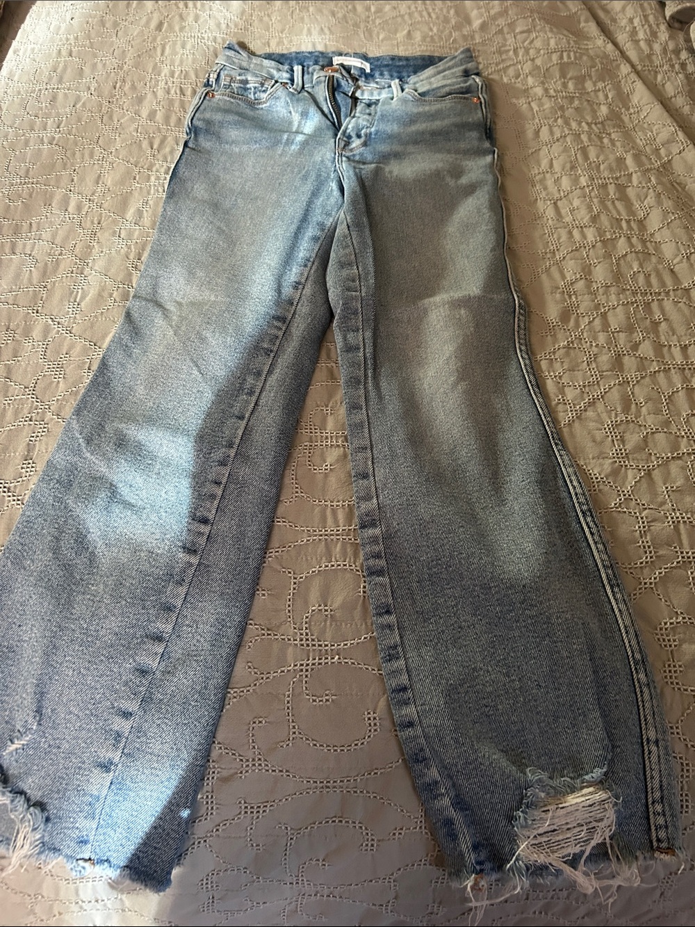 Good American Light Blue Flare Jeans with Frayed Hems